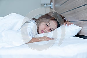 Young Woman Sleeping Cozily