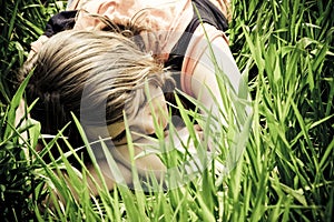 Young woman slept on the grass