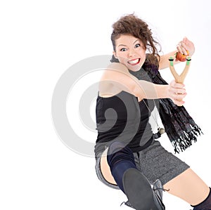 Young woman with slingshot