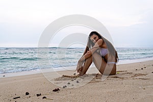 Young Woman Smiling on the Beach