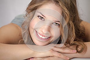 Young woman is smiling at camera 2