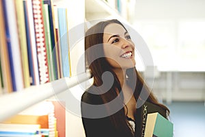 Young woman smiling with head tilted