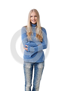 Young woman smiling in jeans and pullover