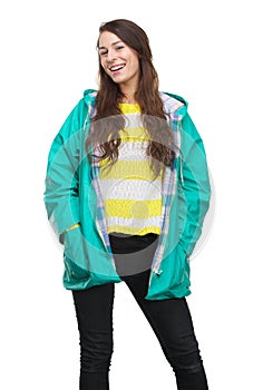 Young woman smiling with raincoat