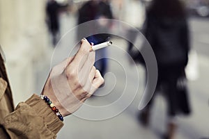 Young woman smoking a cigarette