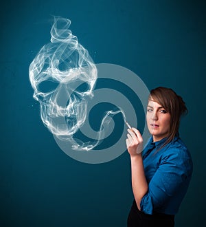 Young woman smoking dangerous cigarette with toxic skull smoke