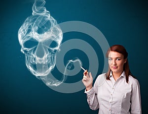 Young woman smoking dangerous cigarette with toxic skull smoke