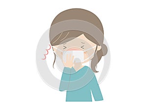 Young woman sneezing photo