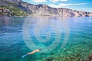 Young woman snorkeling