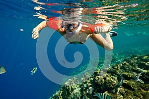 Young woman snorkeling