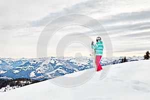 Young woman with snowboard