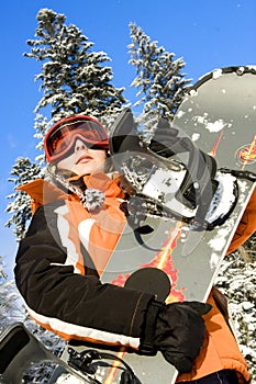 Young woman snowboarder