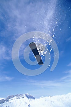 Young woman snowboarding