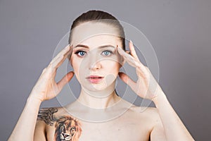 Young woman with soft skin after Spa treatments and cosmetics