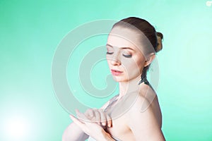 young woman with soft skin after Spa treatments and cosmetics