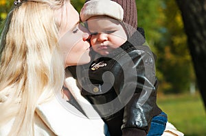 The young woman with the son on walk