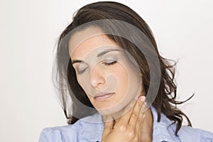 Young woman with sore throat