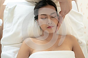 Young Woman during Spa Salon Body massage Hands Treatment