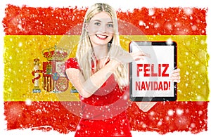 Young woman spainish national flag Merry Christmas Feliz Navidad