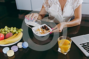 A young woman spends time at home, in the kitchen and in the roo