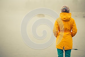 Young Woman standing alone outdoor Travel Lifestyle