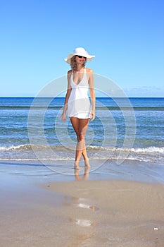 Young woman standing on a beach