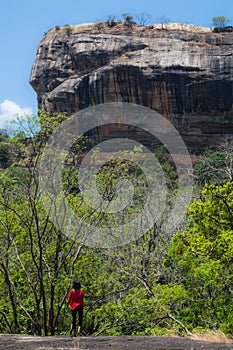 Young Woman Standing in Front of Sigiriya Lionâ€™s Rock Rock Fortress