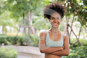 Young woman standing outdoor in the park