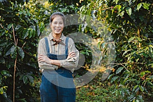 young woman standing with smiling at coffee farm