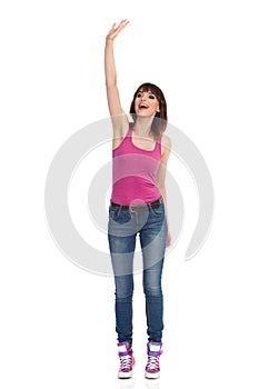 Young Woman Is Standing, Waving Hand And Shouting