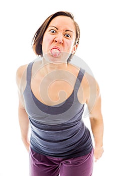 Young woman sticking her tongue out