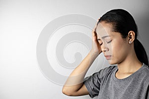 Young woman with of stress and headaches