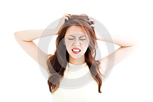 Young Woman stressed going crazy and pulling her hair