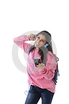 Young woman or student girl with mobile phone listening to music headphones singing and dancing
