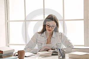 Young woman study at home alone education