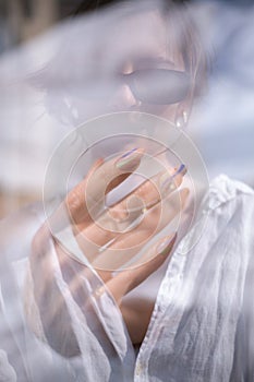 Young woman with stylish manicure