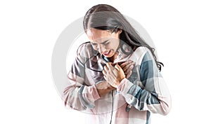 Young woman with a sudden heart attack, holding her chest tightly in the heart area