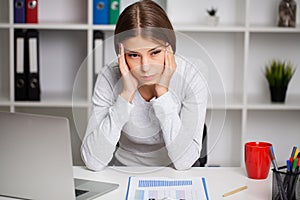 Young woman suffer from dizziness or vertigo holding her head