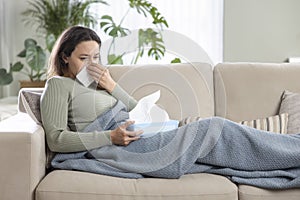 Young woman suffering from cold