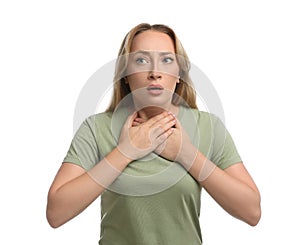 Young woman suffering from pain during breathing on white background