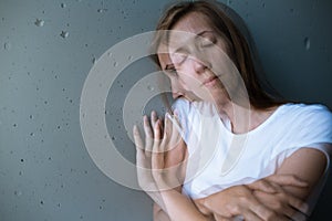 Young woman suffering from a severe depression