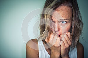 Young woman suffering from a severe depression