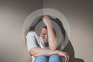 Young woman suffering from a severe depression and anxiety, psychiatric problem after covid-19