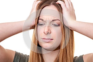 Young woman suffers from headache