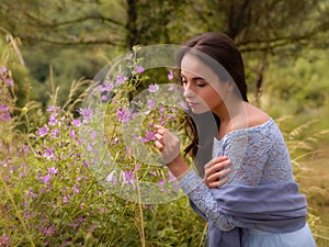 Young woman in summer garden