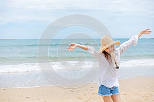 Young woman in sun hat on the  beach. summer, holidays, vacation, travel concept
