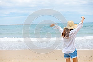 Young woman in sun hat on the  beach. summer, holidays, vacation, travel concept