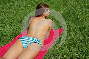 Young woman sunbathing