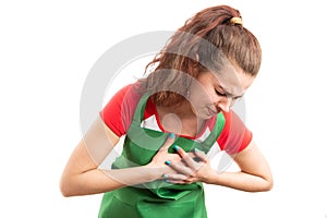 Woman supermarket employee suffering heart pain