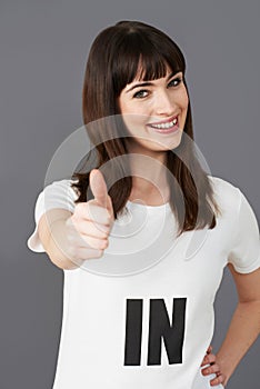 Young Woman Supporter Wearing T Shirt Printed With IN Slogan